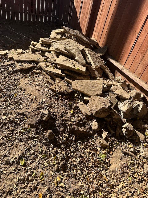 Concrete being broken out in a Pasadena yard